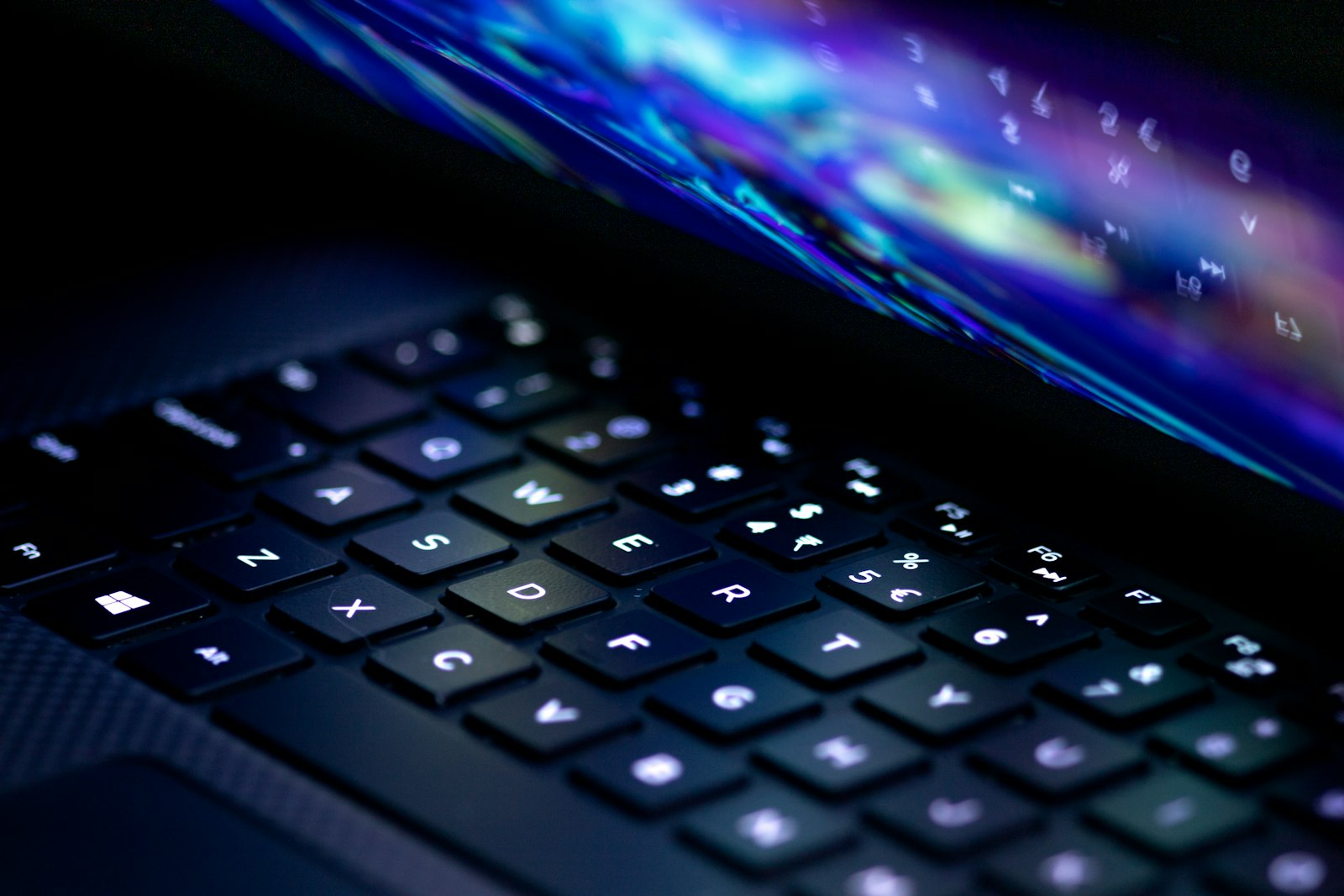 Backlit laptop keyboard in the dark